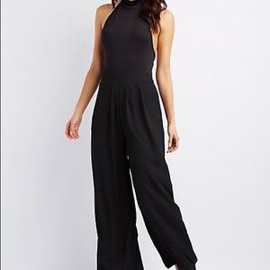 Black halter top jumpsuit! Brand new with tags